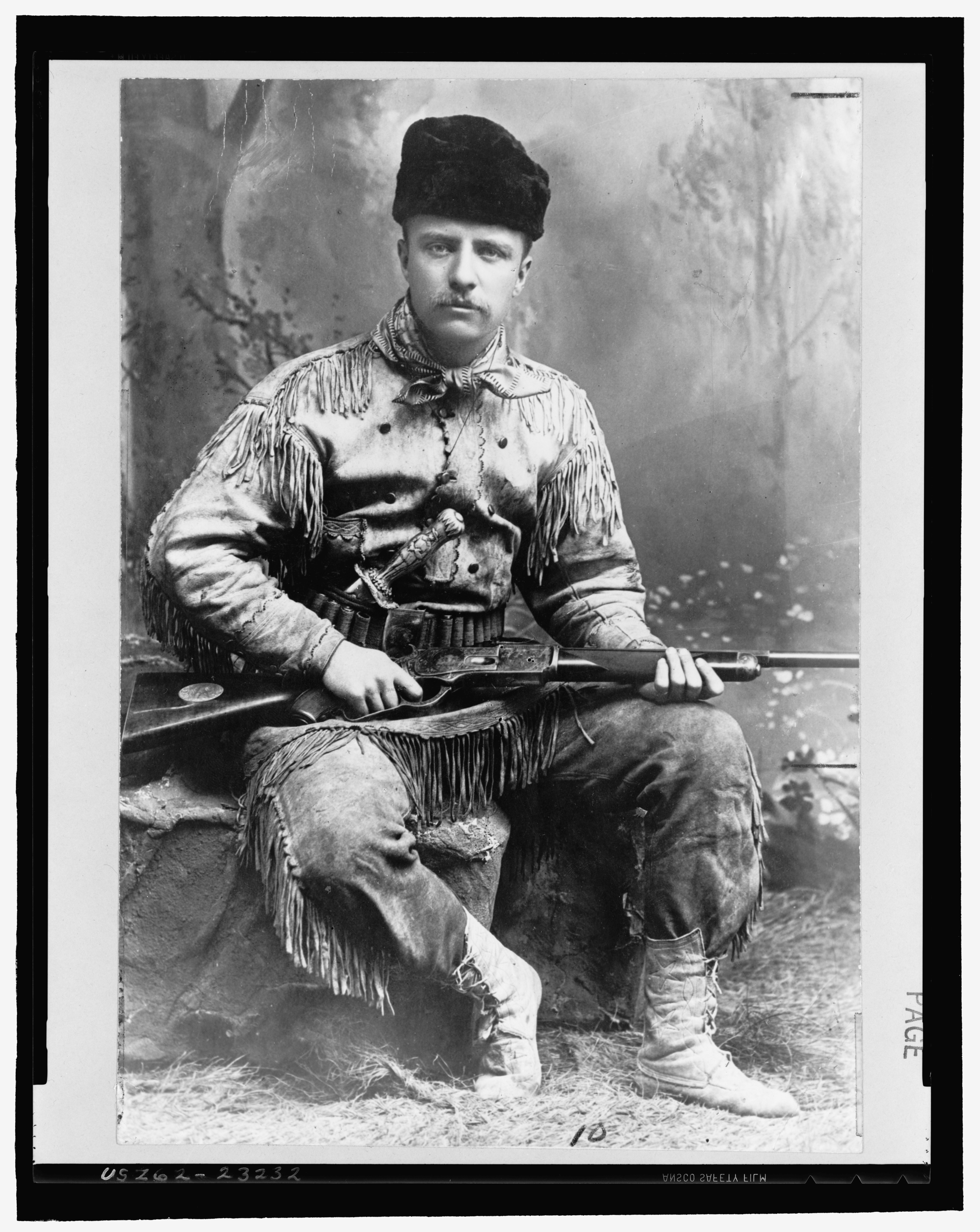 Theodore_Roosevelt_with_hunting_suit_and_rifle_3a24199u_original.jpg