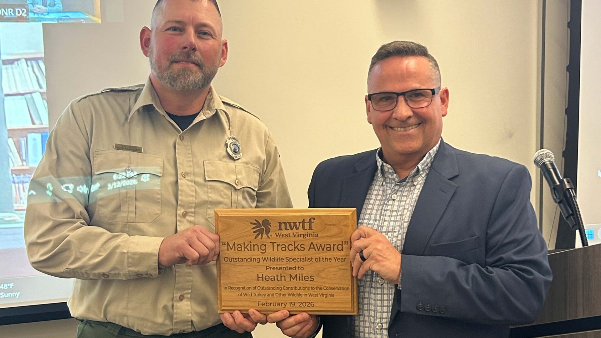 WVDNR natural resources police officer Cody Smith receives the National Wild Turkey Federation's Sharp Spur Award