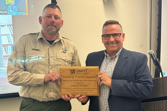 WVDNR natural resources police officer Cody Smith receives the National Wild Turkey Federation's Sharp Spur Award