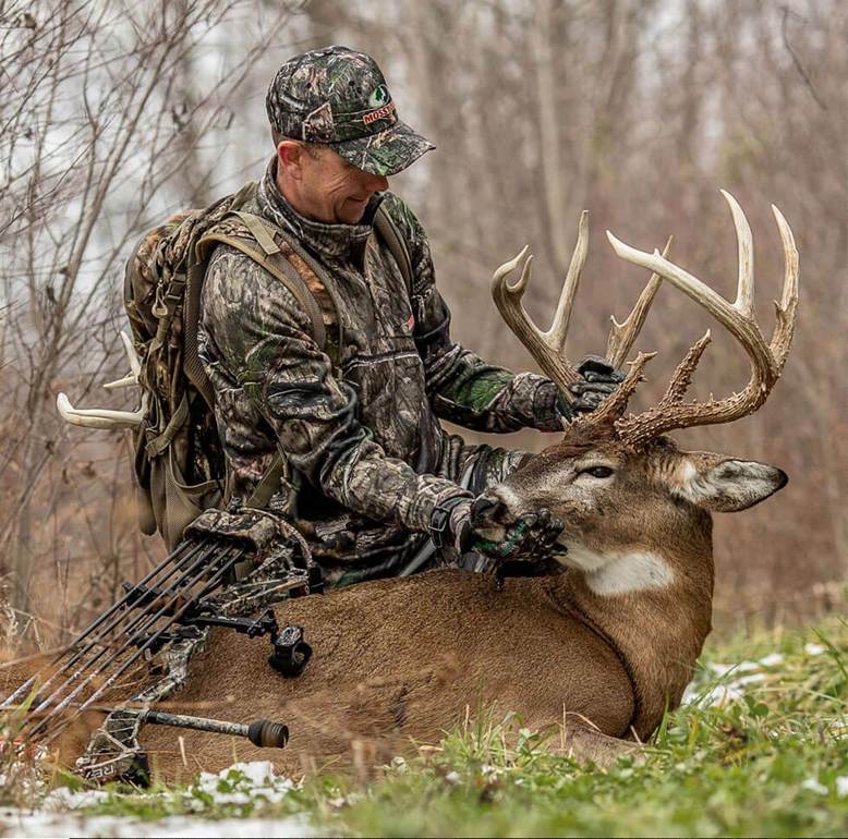 Hunter with deer
